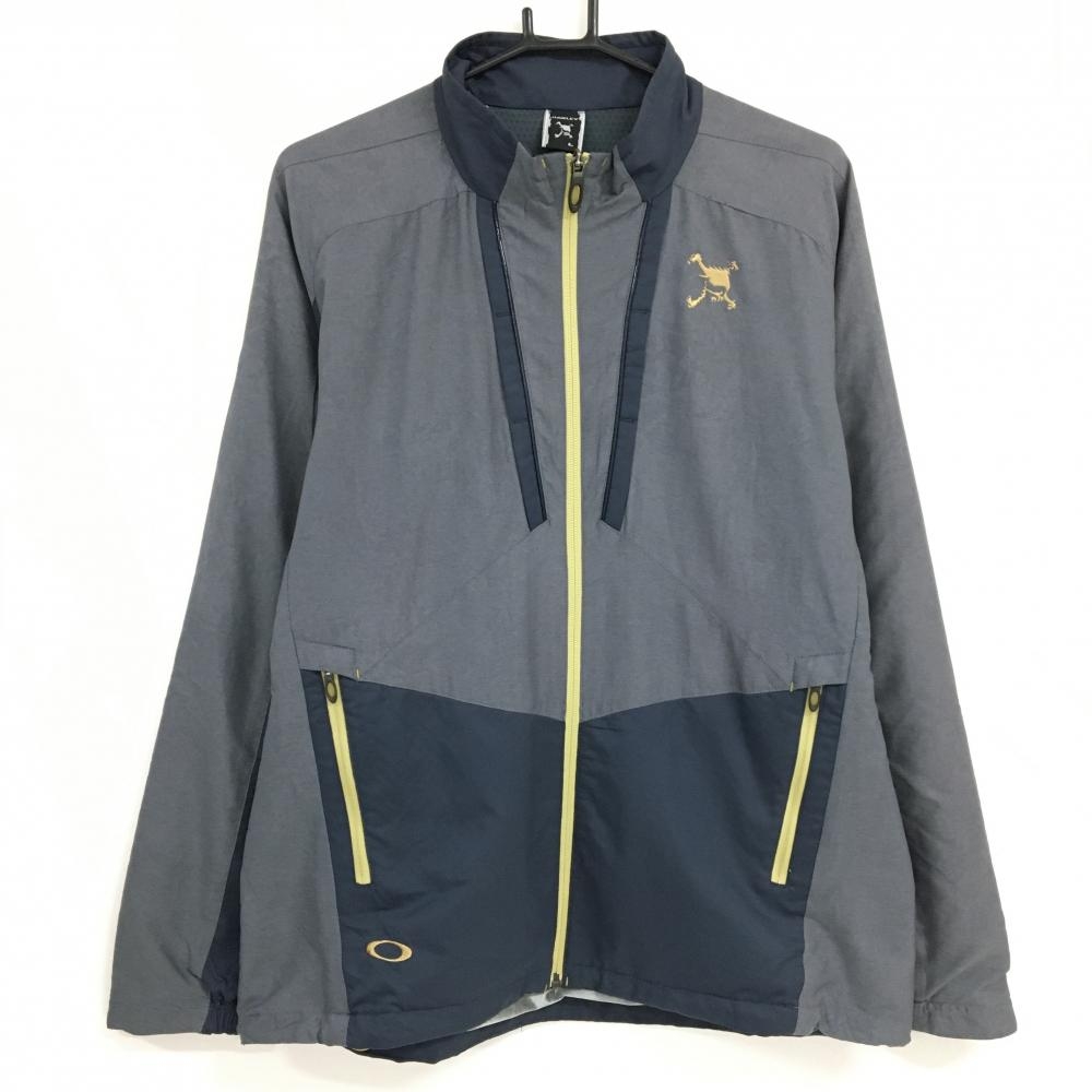 【美品】オークリー ジャケット グレー×ネイビー 裏地一部蓄熱素材  メンズ L ゴルフウェア Oakley