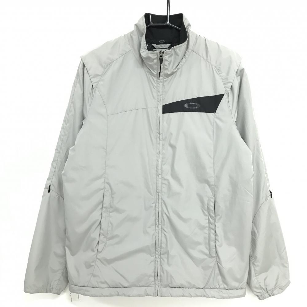 オークリー ジャケット ライトグレー×黒 ロゴ ジップポケット 裏地付  メンズ M ゴルフウェア Oakley
