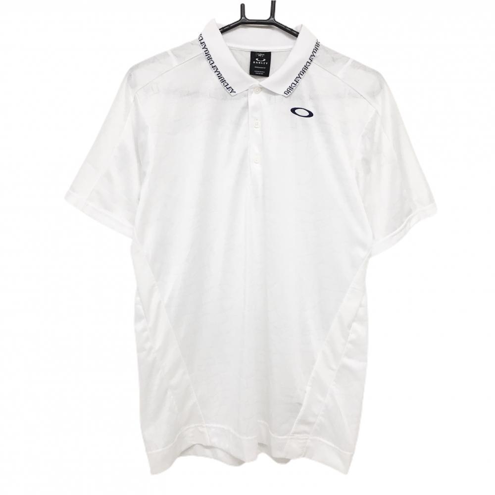 【超美品】オークリー 半袖ポロシャツ 白 地模様総柄 襟ロゴ メンズ L ゴルフウェア Oakley