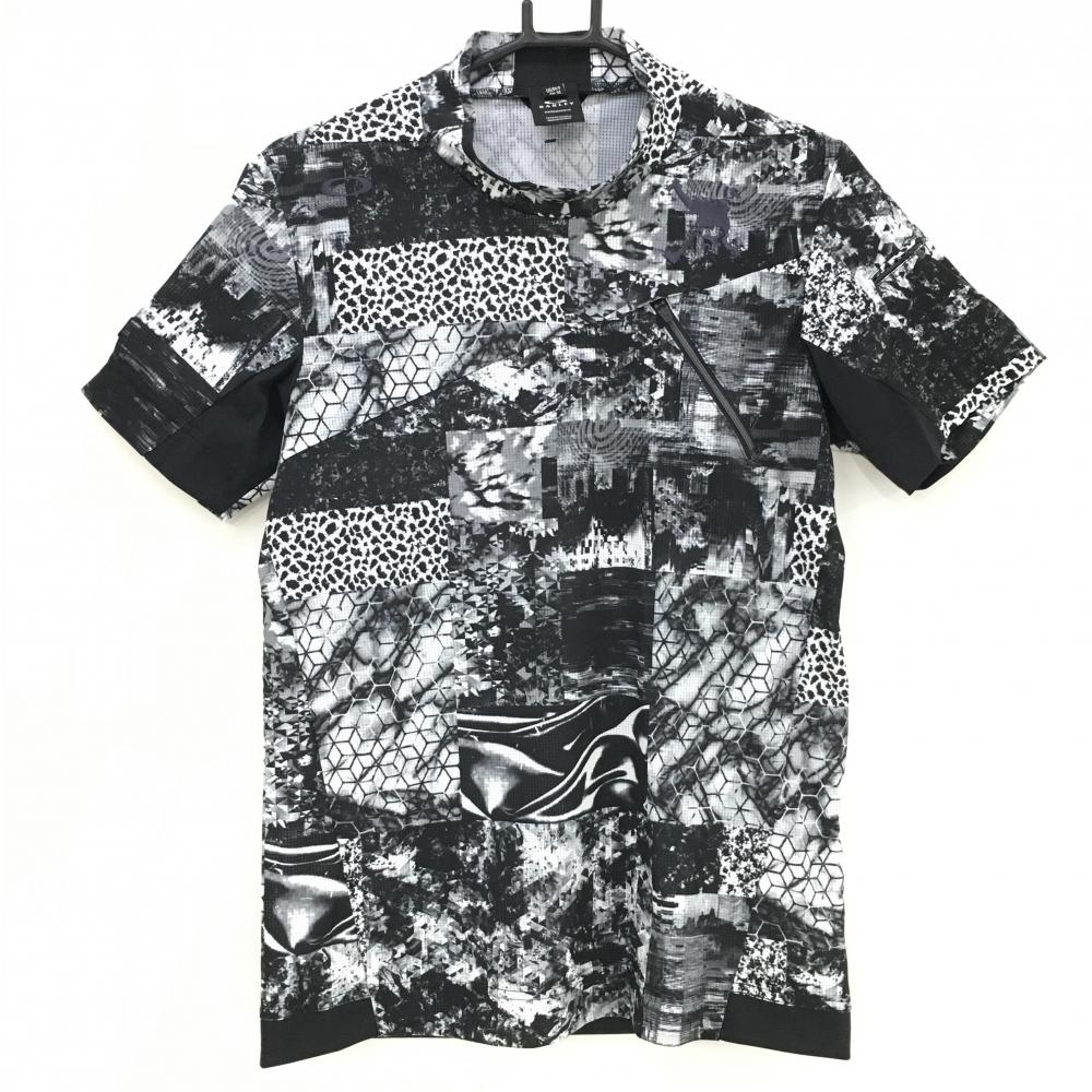 【超美品】オークリー 半袖ハイネックシャツ 黒×白 総柄 メッシュ地 ティー装着可 メンズ M ゴルフウェア 2023年モデル Oakley