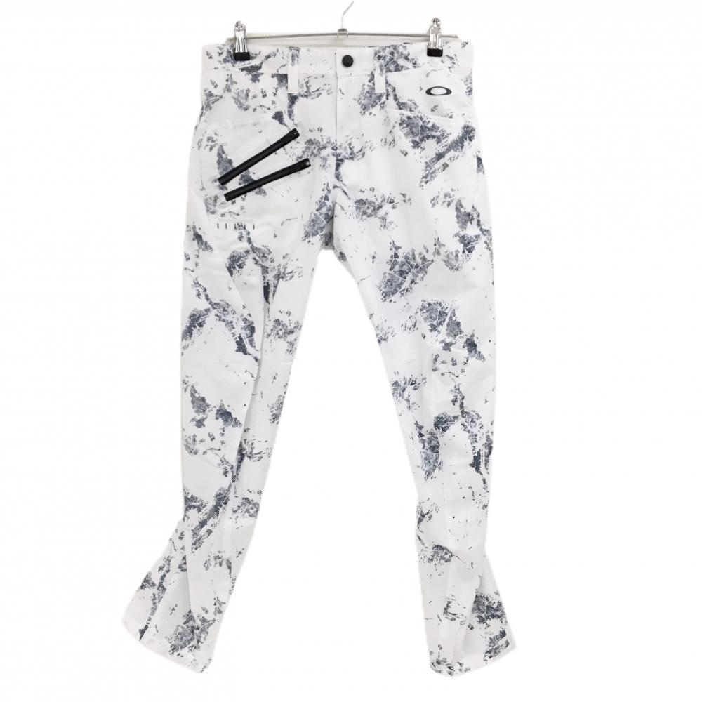 【新品】オークリー パンツ 白×ネイビー 総柄 ストレッチ 吸汗速乾 UVカット メンズ 32 ゴルフウェア Oakley