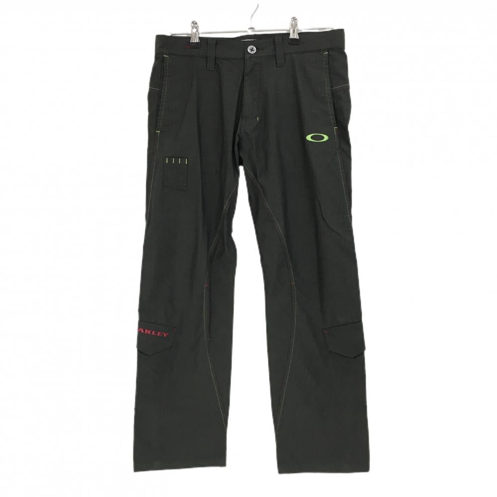 【美品】オークリー パンツ カーキ ヘリンボーン織生地 ロゴライトグリーン ティー装着可 メンズ 33 ゴルフウェア Oakley