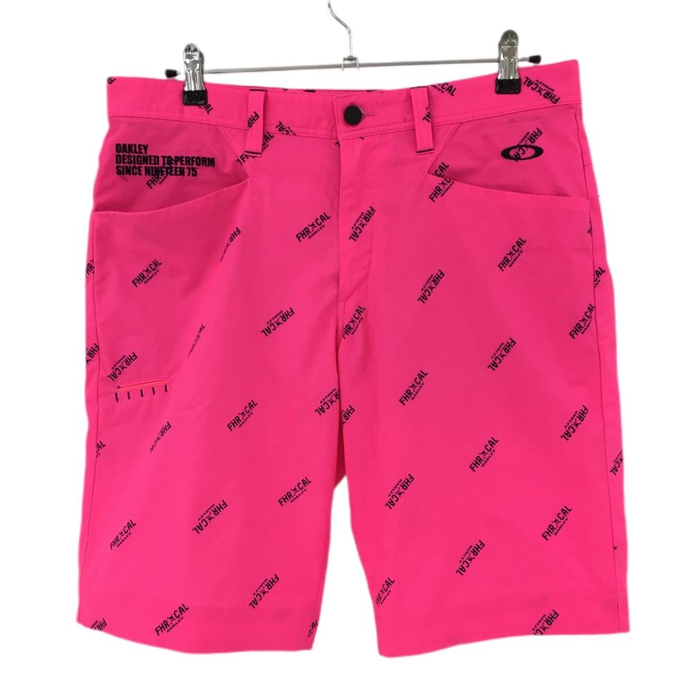 オークリー ハーフパンツ 蛍光ピンク×ネイビー ロゴ総柄 ティー装着可  メンズ 36 ゴルフウェア Oakley 画像