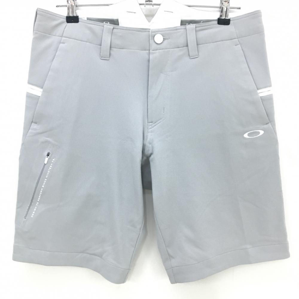 【超美品】オークリー ハーフパンツ グレー 格子織生地 ティー装着可 ストレッチ HYDROLIX メンズ 32 ゴルフウェア Oakley