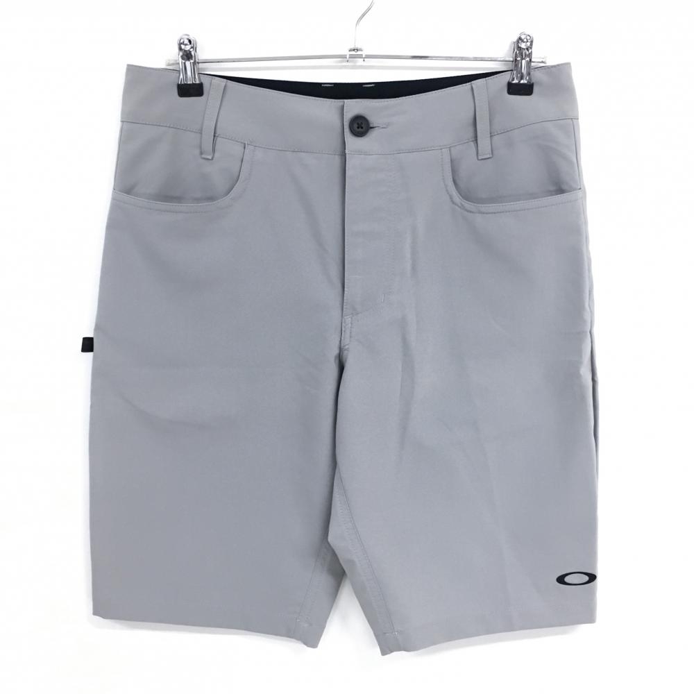 【超美品】オークリー ハーフパンツ ライトグレー ロゴ黒 メンズ 34 ゴルフウェア Oakley
