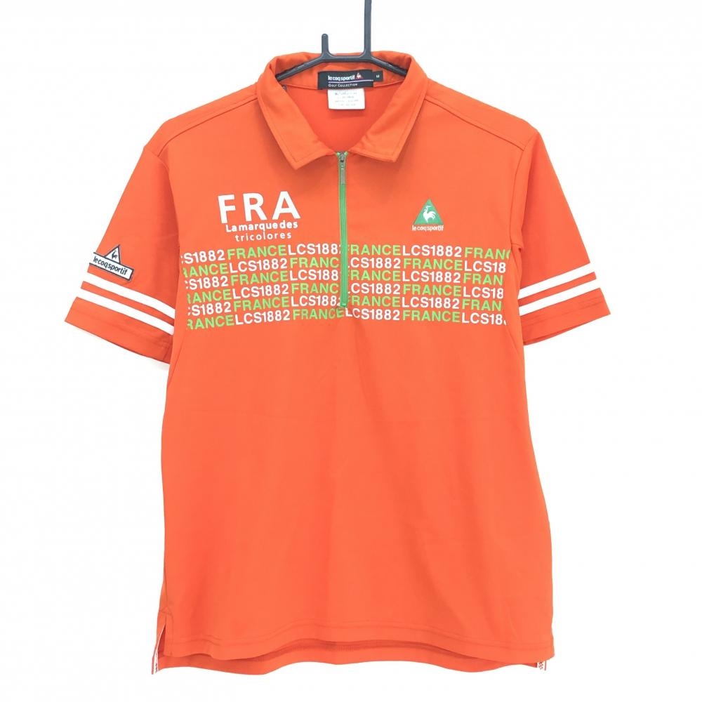 【超美品】ルコックゴルフ 半袖ポロシャツ オレンジ×白 英字プリント ハーフジップ 袖2ライン メンズ M ゴルフウェア le coq sportif