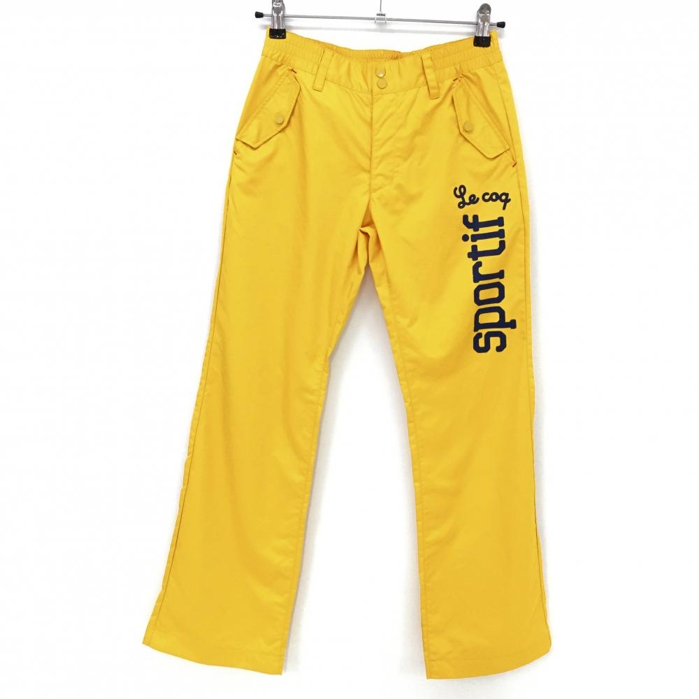 ルコック パンツ イエロー×ネイビー ロゴプリント 光沢感 ウエストゴム レディース 7 ゴルフウェア le coq sportif