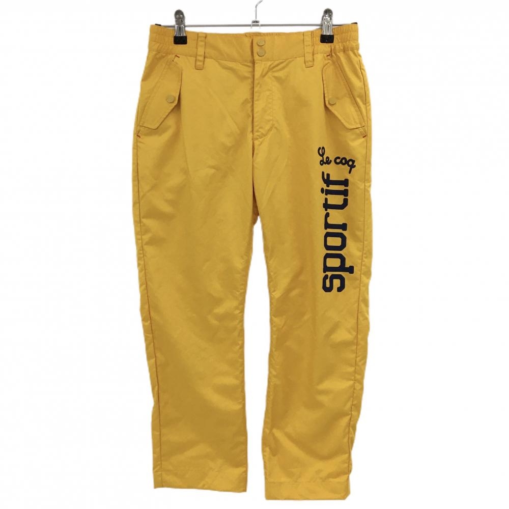 ルコック 半端丈パンツ イエロー フラップポケット ロゴプリント レディース 9 ゴルフウェア le coq sportif