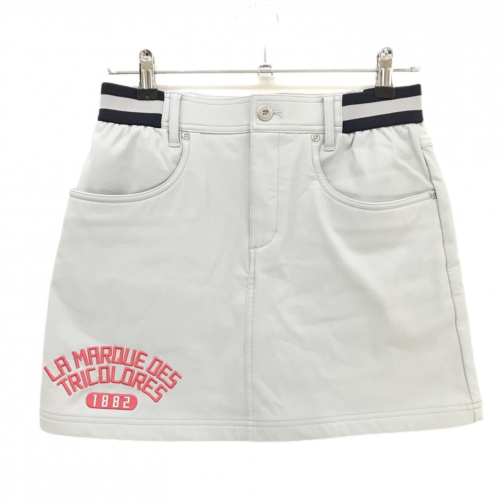 【超美品】ルコックゴルフ スカート ライトグレー×ネイビー ロゴピンク ウエスト一部ゴム  レディース 9 ゴルフウェア le coq sportif