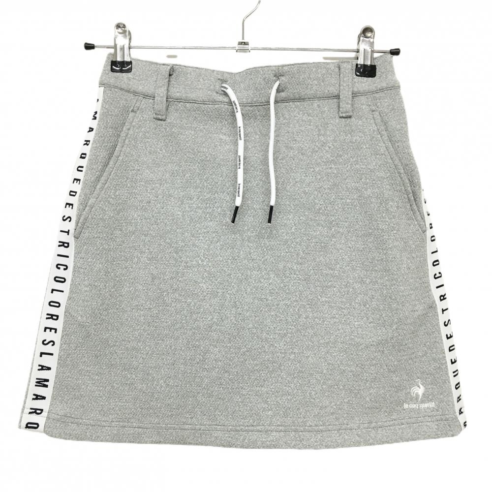 【超美品】ルコックゴルフ スカート グレー 地模様 サイト英字テープ レディース M ゴルフウェア le coq sportif