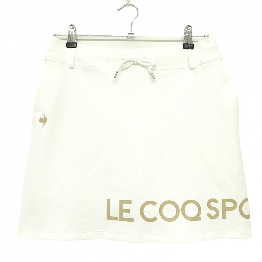 【新品】ルコックゴルフ スカート 白 ロゴベージュ ウエスト一部ゴム 内側インナーパンツ  レディース 13 ゴルフウェア le coq sportif