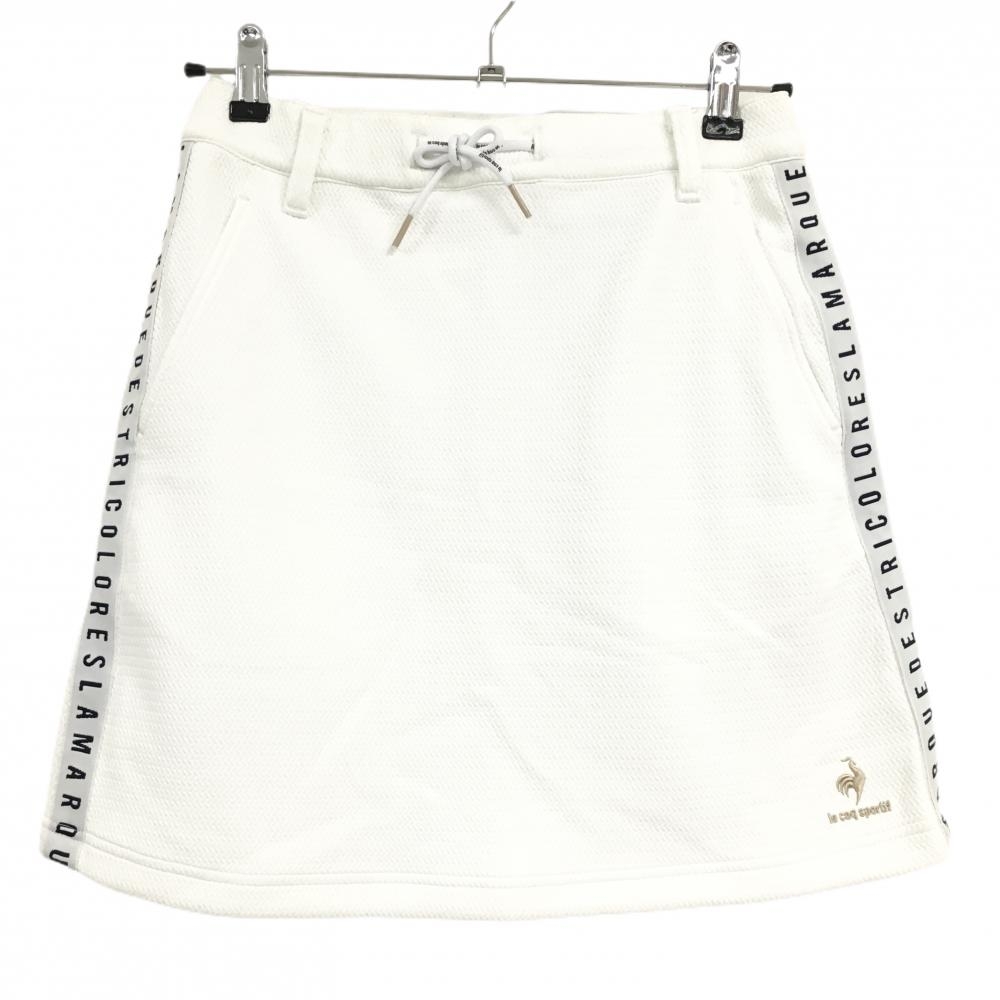 【新品】ルコックゴルフ スカート 白×黒 サイド英字ライン 織生地 ストレッチ 吸汗性 レディース L ゴルフウェア le coq sportif
