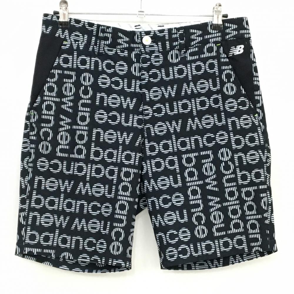 【美品】ニューバランスゴルフ ハーフパンツ 黒系×白 英字ロゴ総柄 ストレッチ メンズ 4(M) ゴルフウェア New Balance